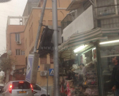 صور: سقوط عدة اشارات ضوئية في شارع ييفت بفعل الرياح العاصفة